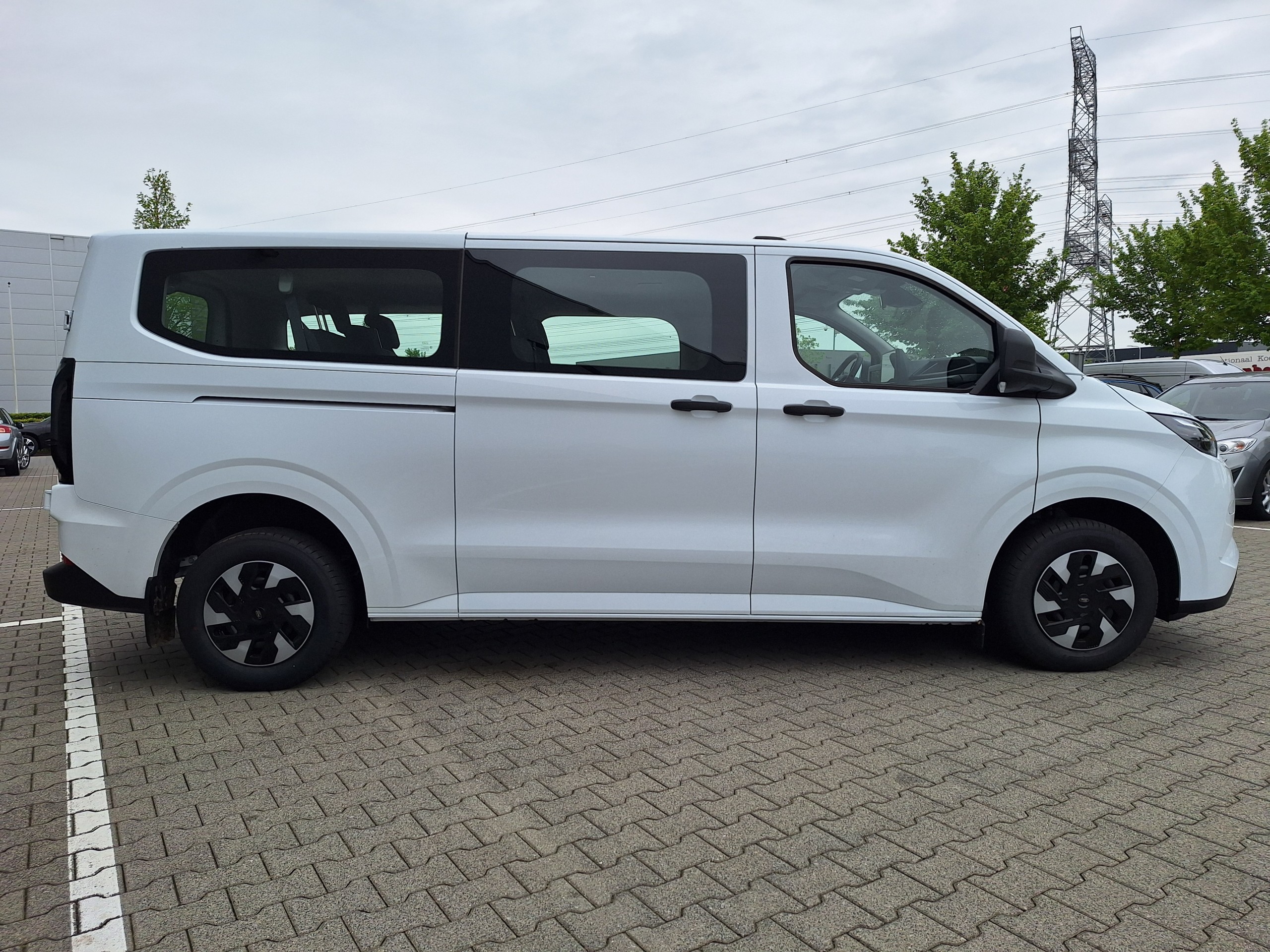 Ford Transit Custum | 340 2.5 PHEV L2H1 Limited | 9 persoons
